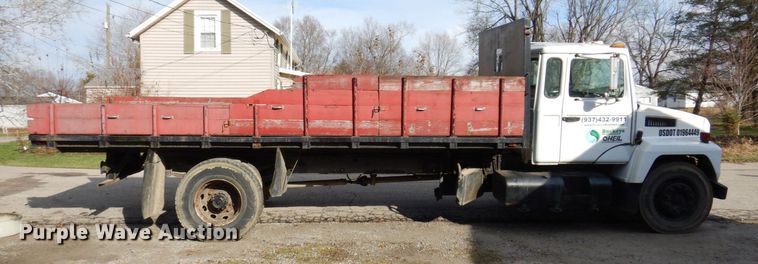 image for item JL9759 1997 Mack CS300P  dump flatbed truck