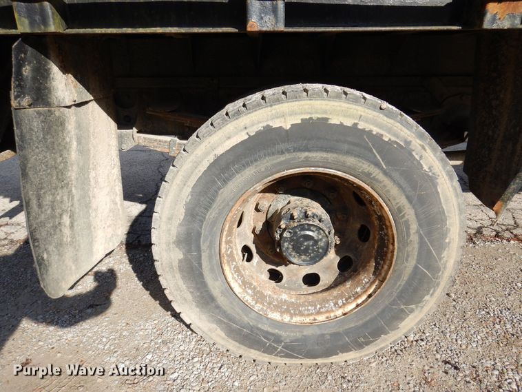 image for item JL9759 1997 Mack CS300P  dump flatbed truck