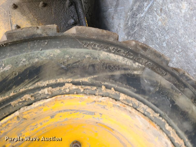 image for item JW9913 2006 Komatsu SK1026-5N  skid steer loader