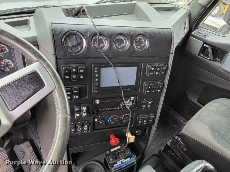 image for item LR9092 2014 Caterpillar CT660 tri-drive hydrovac truck