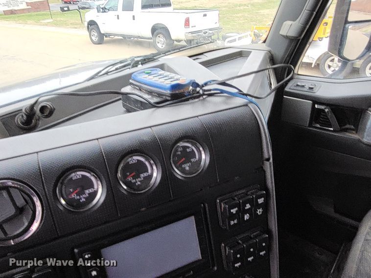 image for item LR9092 2014 Caterpillar CT660 tri-drive hydrovac truck