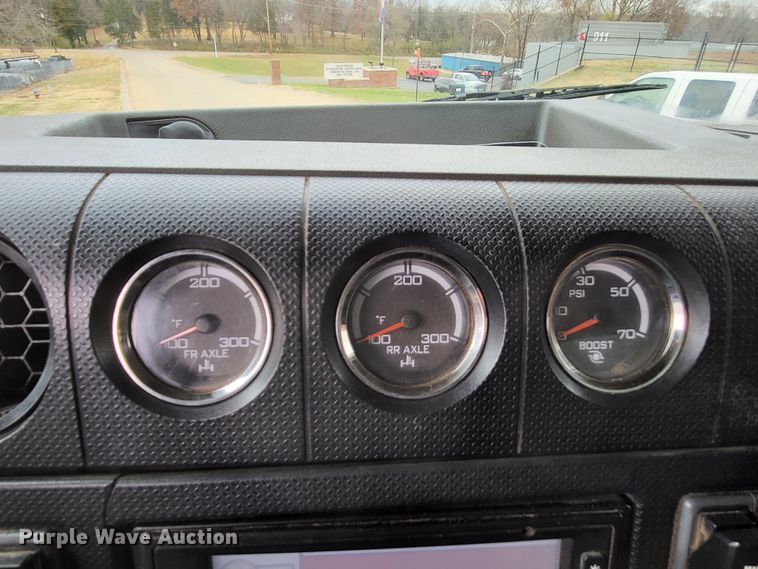 image for item LR9093 2014 Caterpillar CT660  tri-drive hydrovac truck