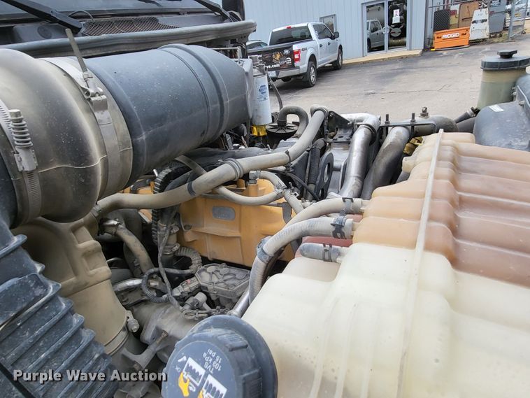 image for item LR9093 2014 Caterpillar CT660  tri-drive hydrovac truck
