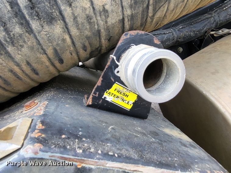 image for item LR9093 2014 Caterpillar CT660  tri-drive hydrovac truck