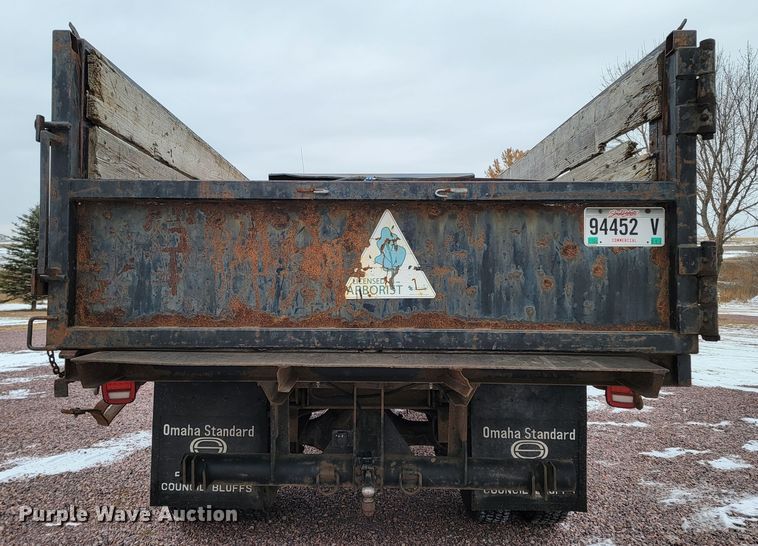 image for item ME9619 1998 Freightliner FL70  dump flatbed truck