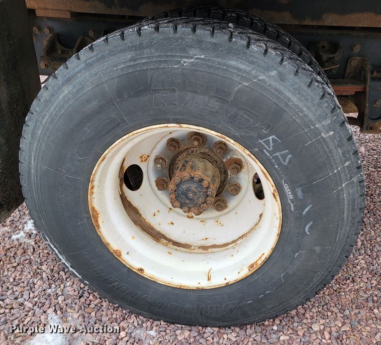 image for item ME9619 1998 Freightliner FL70  dump flatbed truck