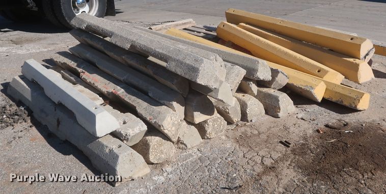 image for item MJ9193 Approximately 100 concrete parking blocks