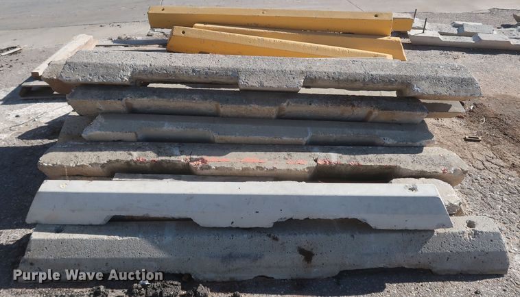 image for item MJ9193 Approximately 100 concrete parking blocks