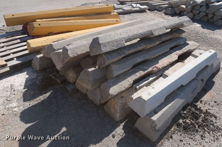 image for item MJ9193 Approximately 100 concrete parking blocks