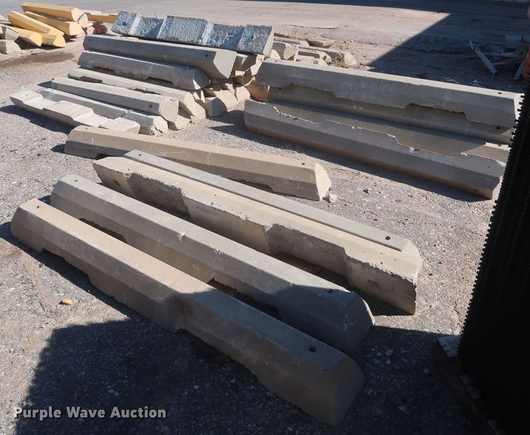 image for item MJ9193 Approximately 100 concrete parking blocks