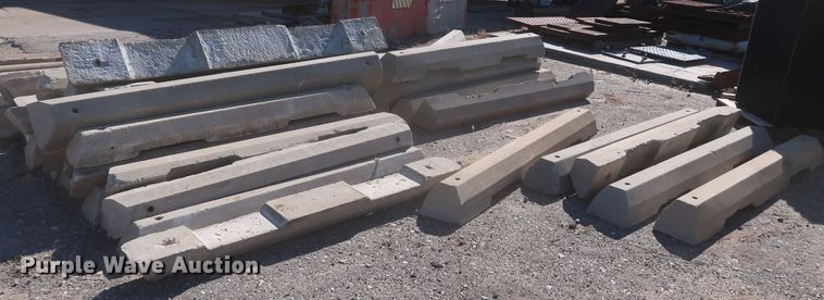 image for item MJ9193 Approximately 100 concrete parking blocks