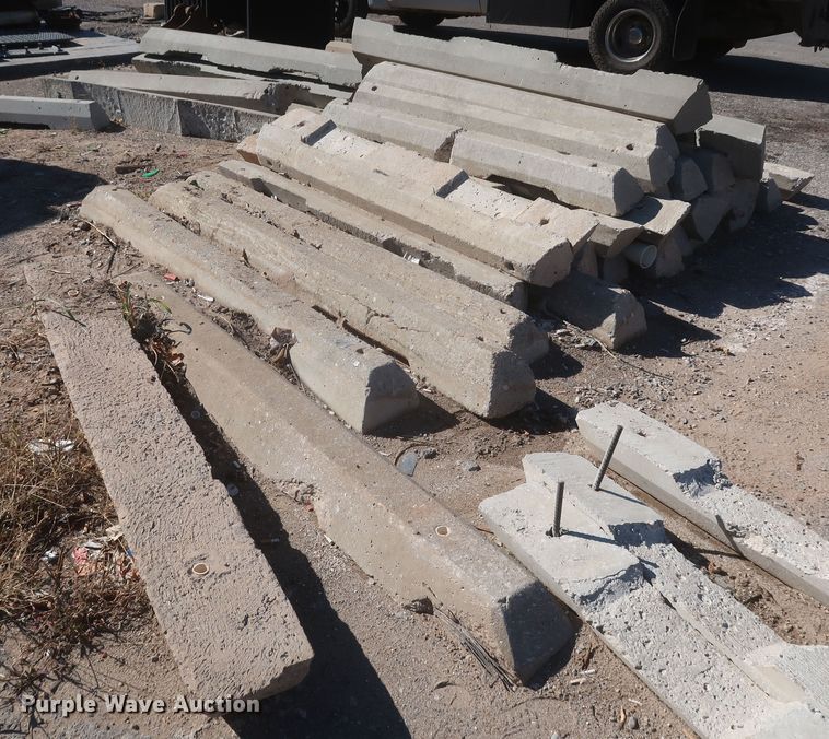 image for item MJ9193 Approximately 100 concrete parking blocks