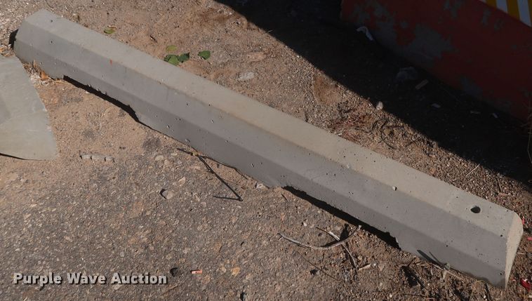 image for item MJ9193 Approximately 100 concrete parking blocks