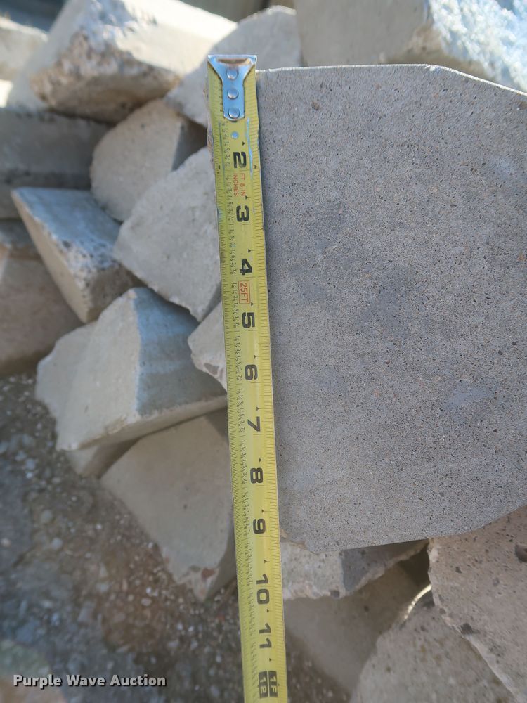 image for item MJ9193 Approximately 100 concrete parking blocks