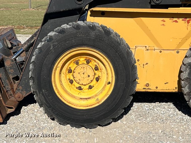 image for item MW9429 1999 New Holland LX665  skid steer loader