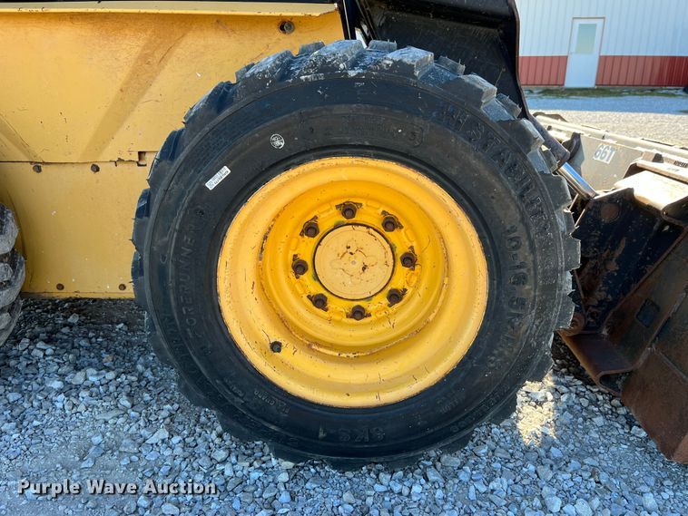 image for item MW9429 1999 New Holland LX665  skid steer loader