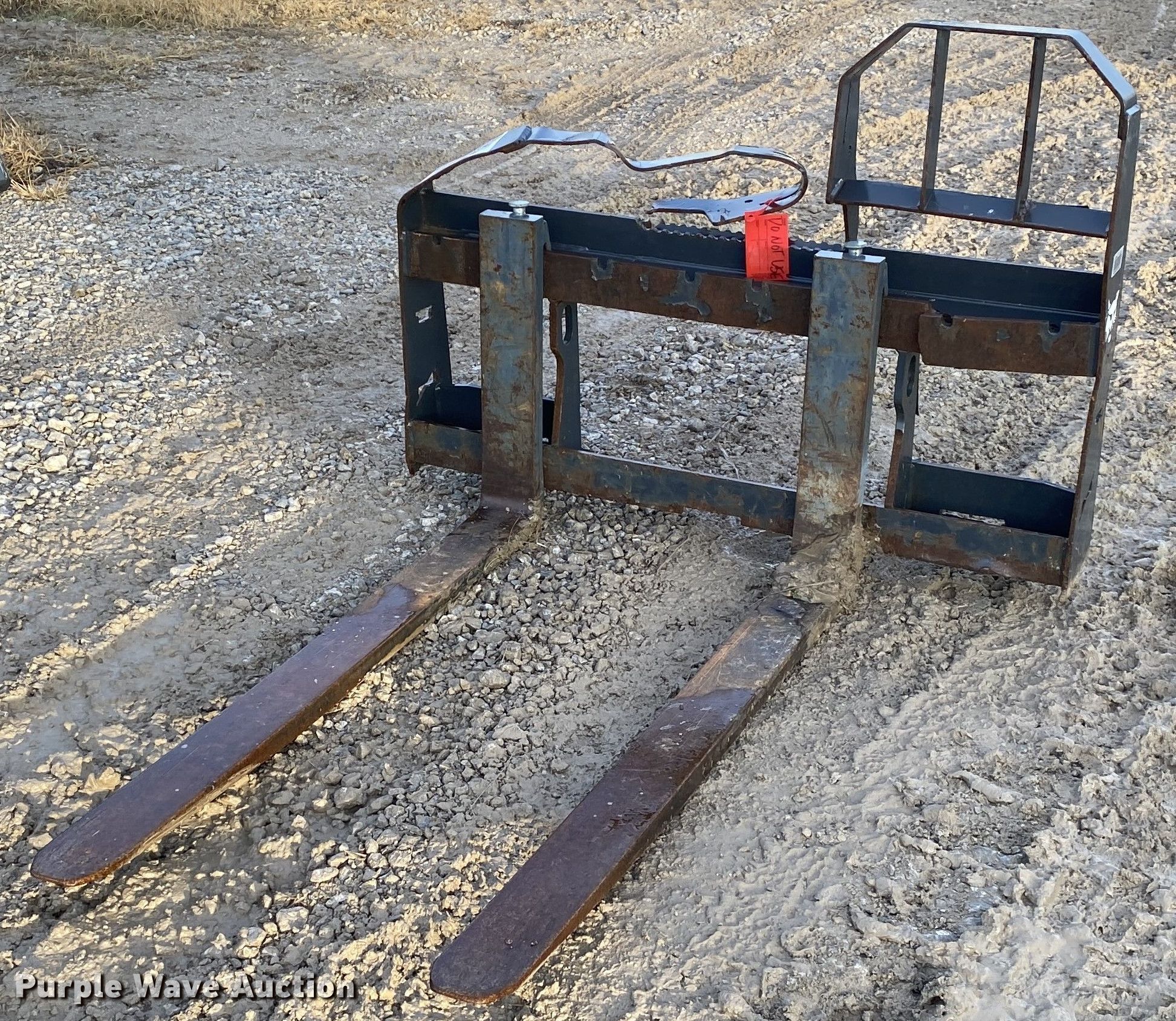 48"L skid steer forks in Tulsa, OK Item DN8098 sold Purple Wave