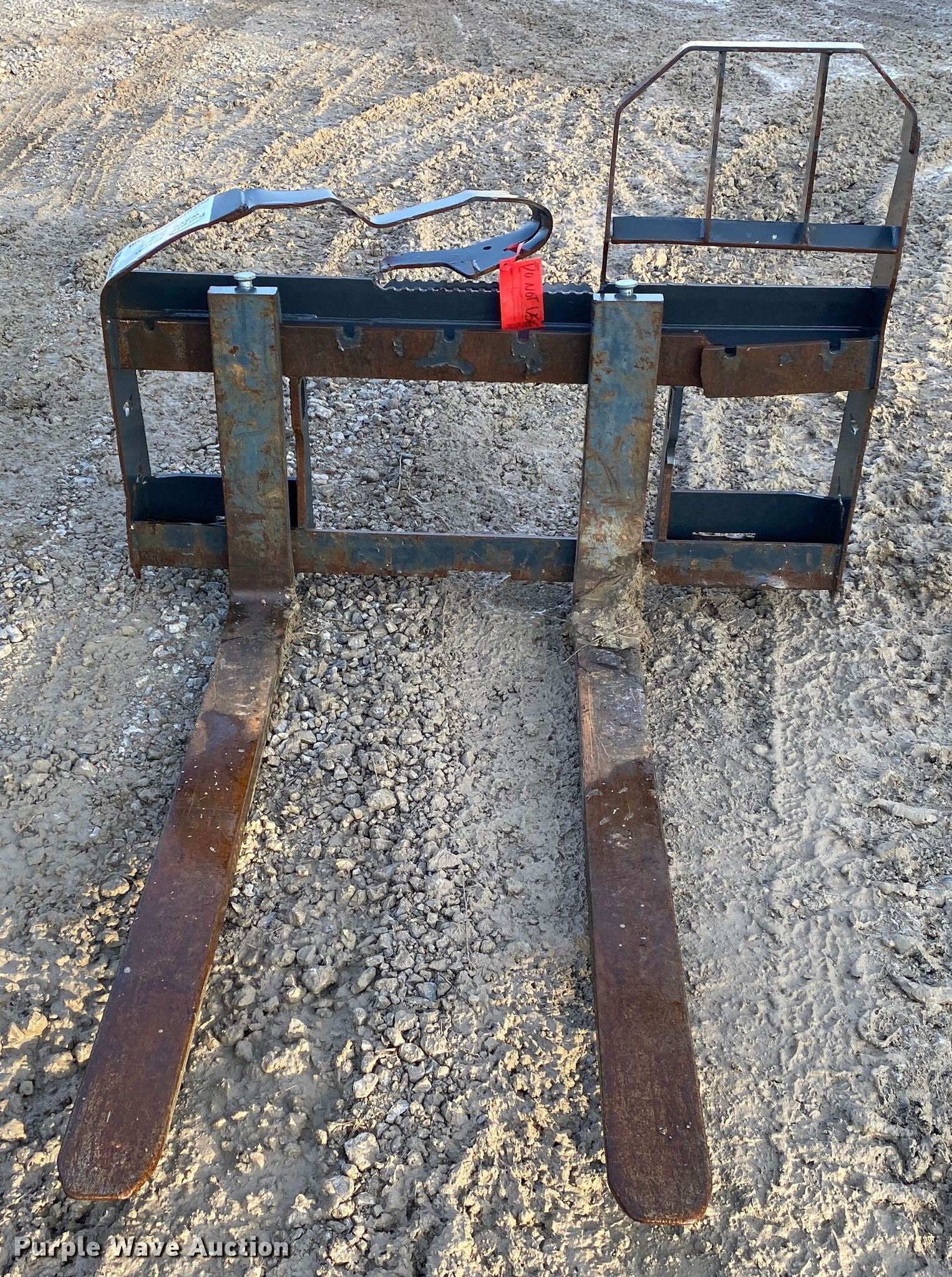 48"L skid steer forks in Tulsa, OK Item DN8098 sold Purple Wave