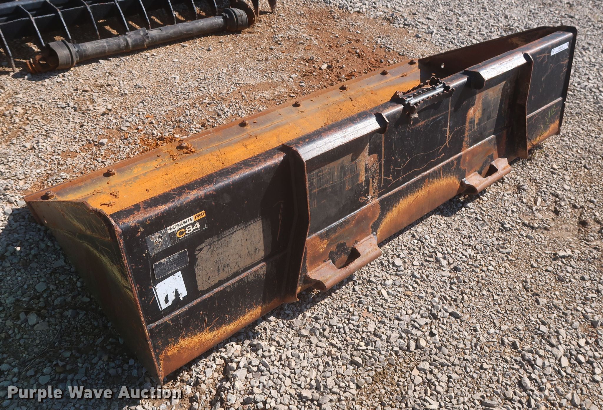 John Deere C84 skid steer bucket in Ardmore, OK Item MJ9122 sold Purple Wave