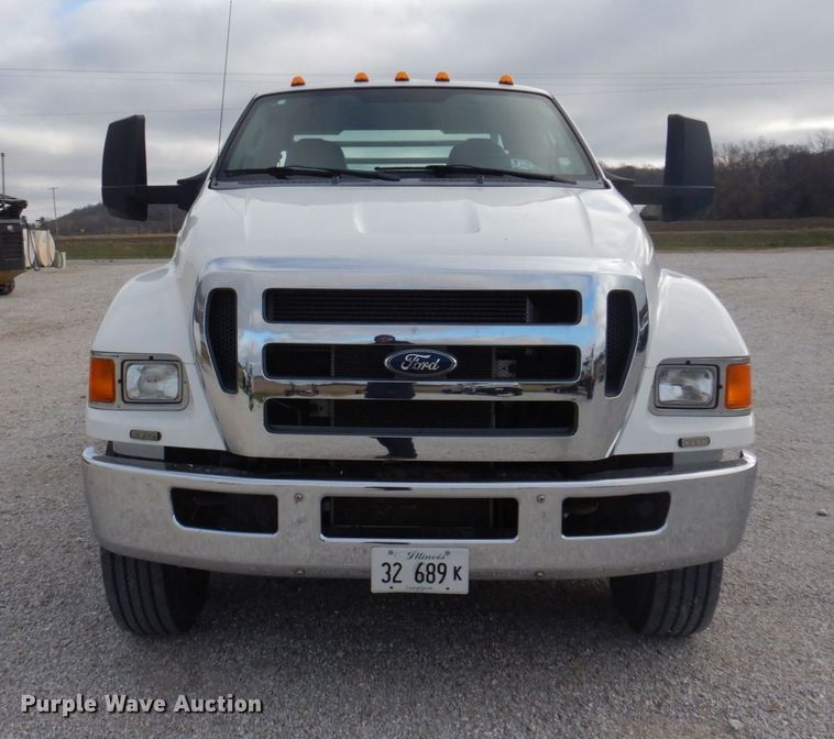 image for item DP0415 2015 Ford F750 Super Duty XLT  SuperCab flatbed truck