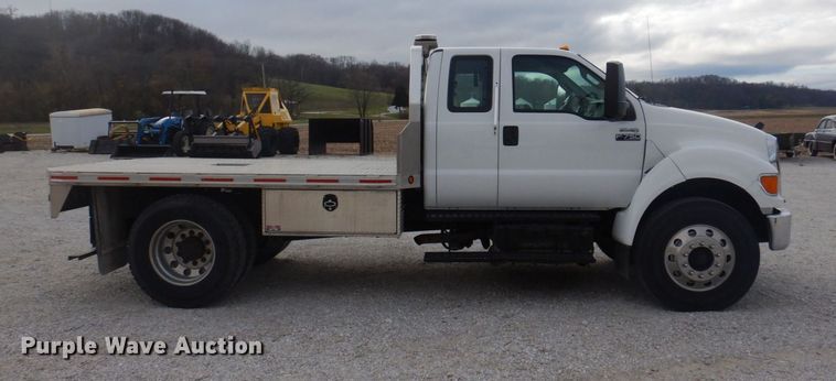 image for item DP0415 2015 Ford F750 Super Duty XLT  SuperCab flatbed truck