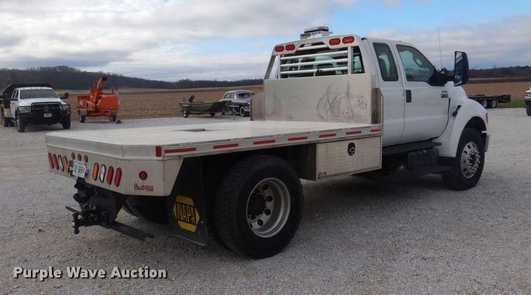 image for item DP0415 2015 Ford F750 Super Duty XLT  SuperCab flatbed truck