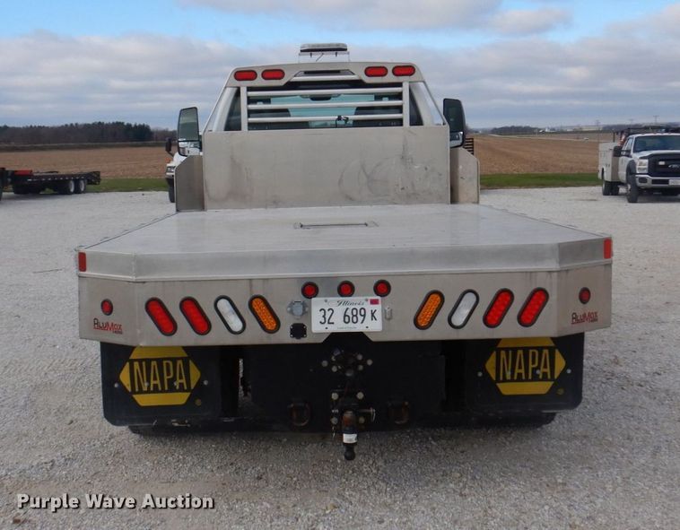 image for item DP0415 2015 Ford F750 Super Duty XLT  SuperCab flatbed truck