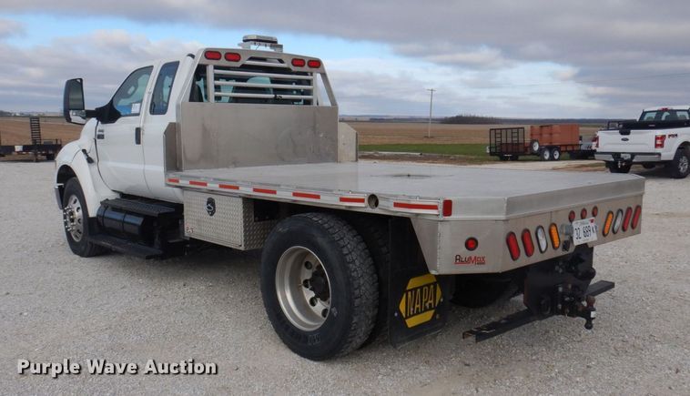 image for item DP0415 2015 Ford F750 Super Duty XLT  SuperCab flatbed truck