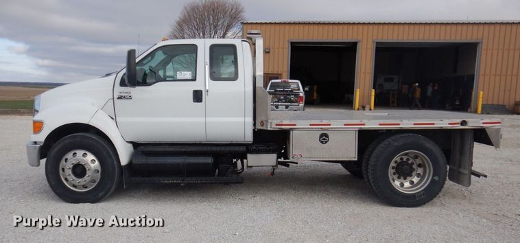 image for item DP0415 2015 Ford F750 Super Duty XLT  SuperCab flatbed truck