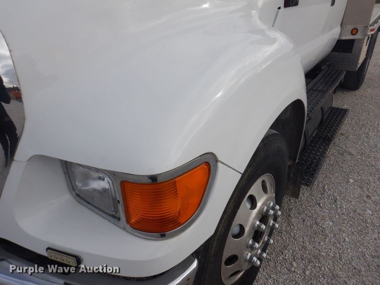 image for item DP0415 2015 Ford F750 Super Duty XLT  SuperCab flatbed truck