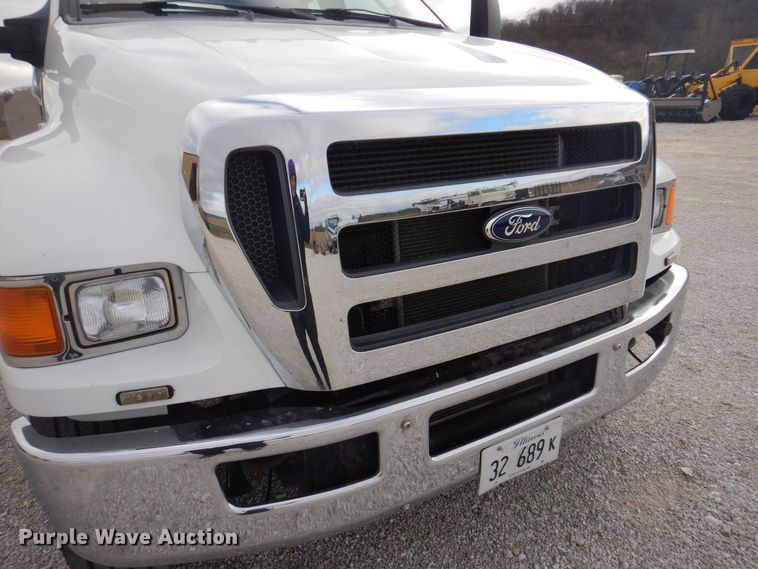 image for item DP0415 2015 Ford F750 Super Duty XLT  SuperCab flatbed truck