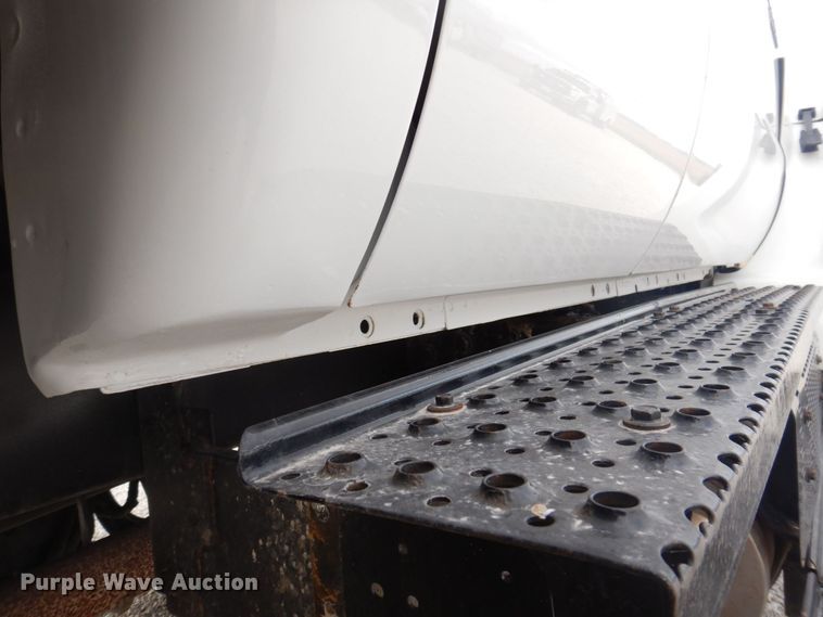 image for item DP0415 2015 Ford F750 Super Duty XLT  SuperCab flatbed truck