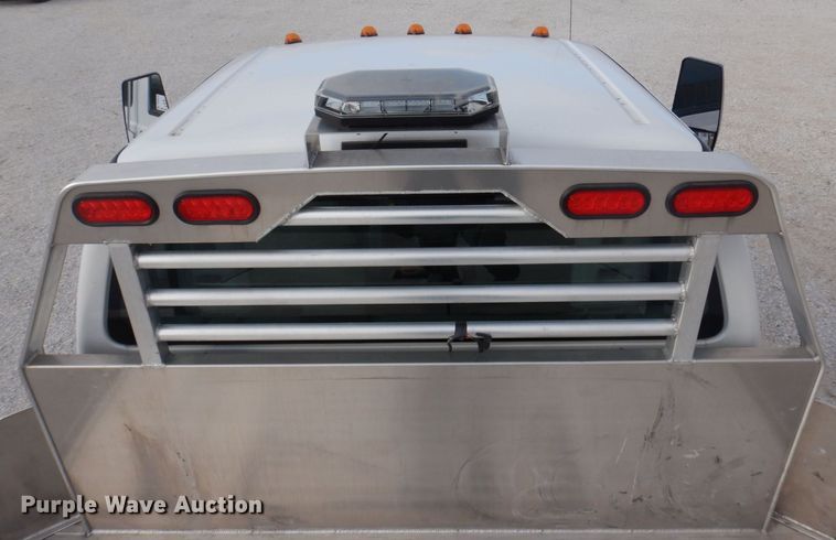 image for item DP0415 2015 Ford F750 Super Duty XLT  SuperCab flatbed truck