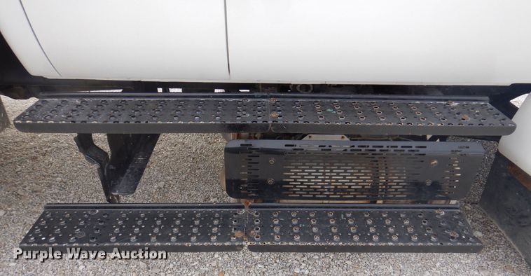 image for item DP0415 2015 Ford F750 Super Duty XLT  SuperCab flatbed truck