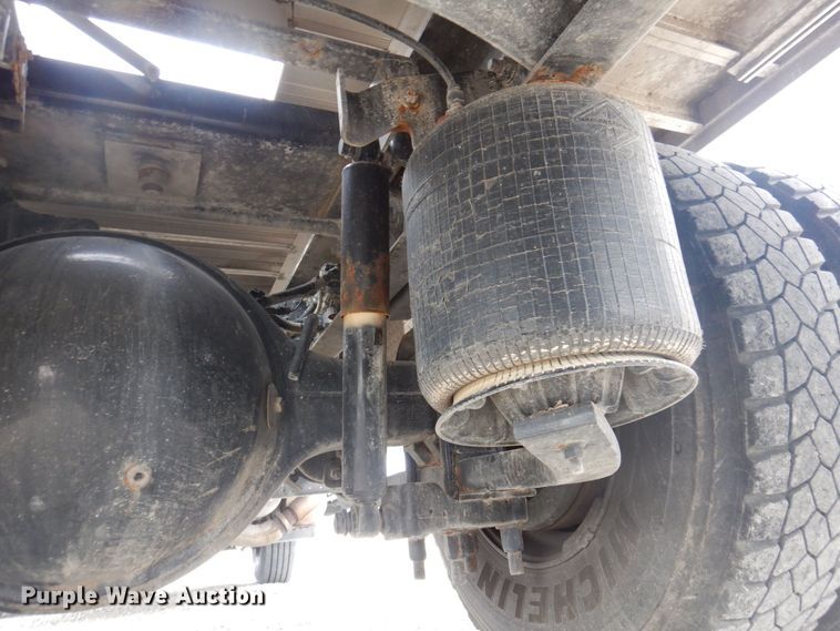 image for item DP0415 2015 Ford F750 Super Duty XLT  SuperCab flatbed truck