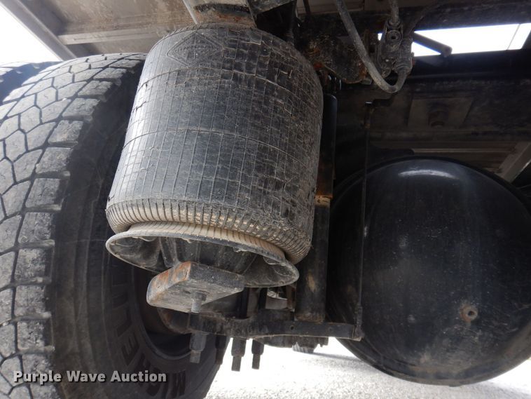 image for item DP0415 2015 Ford F750 Super Duty XLT  SuperCab flatbed truck