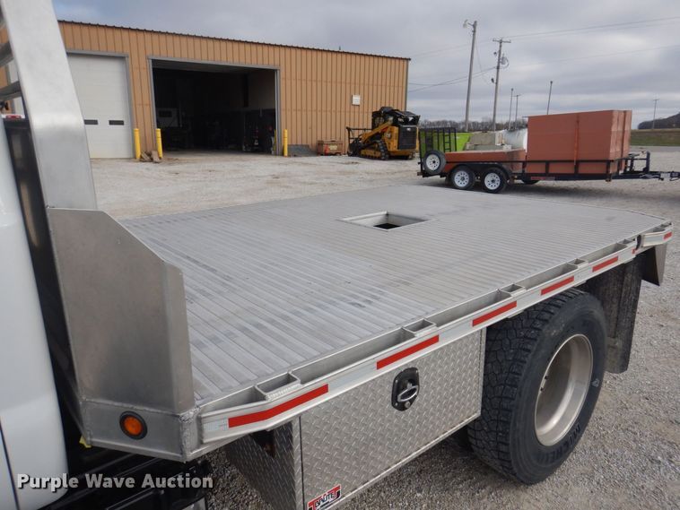 image for item DP0415 2015 Ford F750 Super Duty XLT  SuperCab flatbed truck