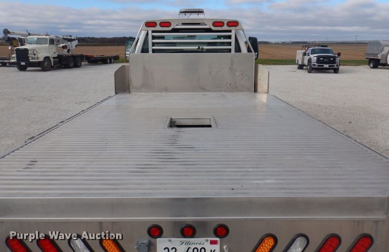 image for item DP0415 2015 Ford F750 Super Duty XLT  SuperCab flatbed truck