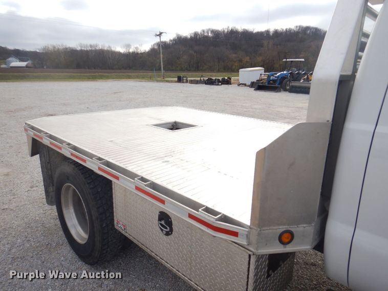 image for item DP0415 2015 Ford F750 Super Duty XLT  SuperCab flatbed truck