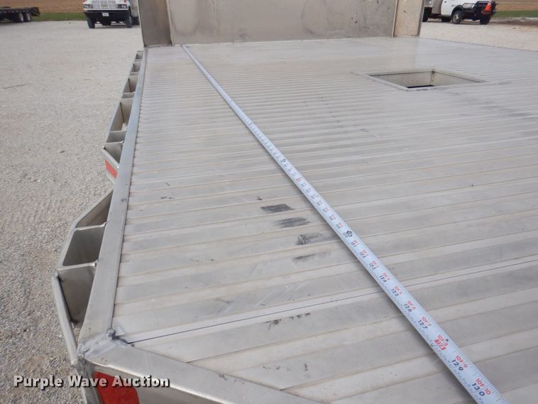 image for item DP0415 2015 Ford F750 Super Duty XLT  SuperCab flatbed truck