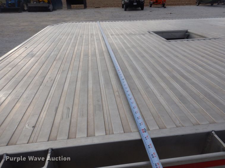 image for item DP0415 2015 Ford F750 Super Duty XLT  SuperCab flatbed truck