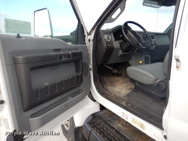 image for item DP0415 2015 Ford F750 Super Duty XLT  SuperCab flatbed truck