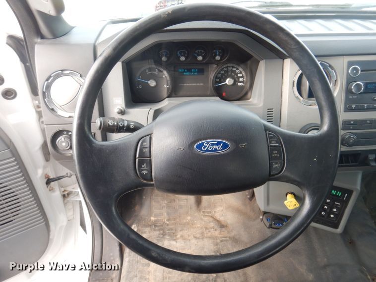 image for item DP0415 2015 Ford F750 Super Duty XLT  SuperCab flatbed truck