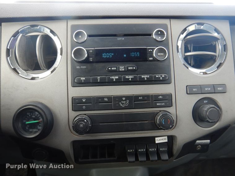 image for item DP0415 2015 Ford F750 Super Duty XLT  SuperCab flatbed truck