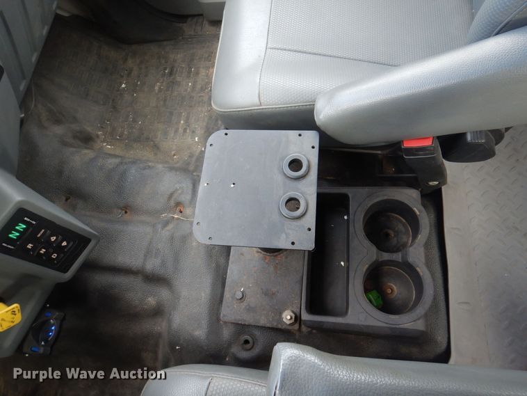 image for item DP0415 2015 Ford F750 Super Duty XLT  SuperCab flatbed truck