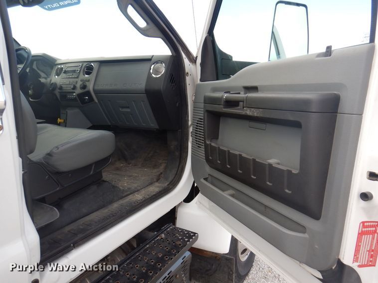 image for item DP0415 2015 Ford F750 Super Duty XLT  SuperCab flatbed truck