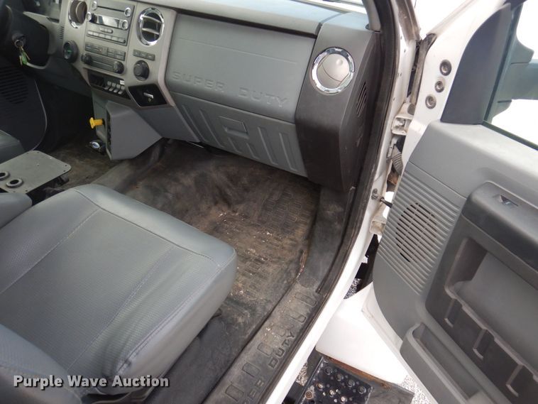 image for item DP0415 2015 Ford F750 Super Duty XLT  SuperCab flatbed truck