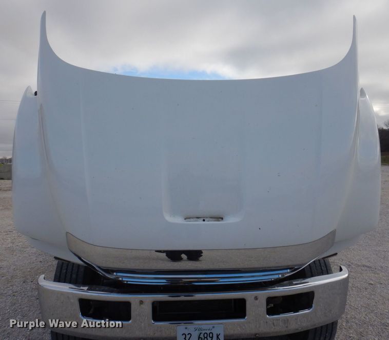 image for item DP0415 2015 Ford F750 Super Duty XLT  SuperCab flatbed truck