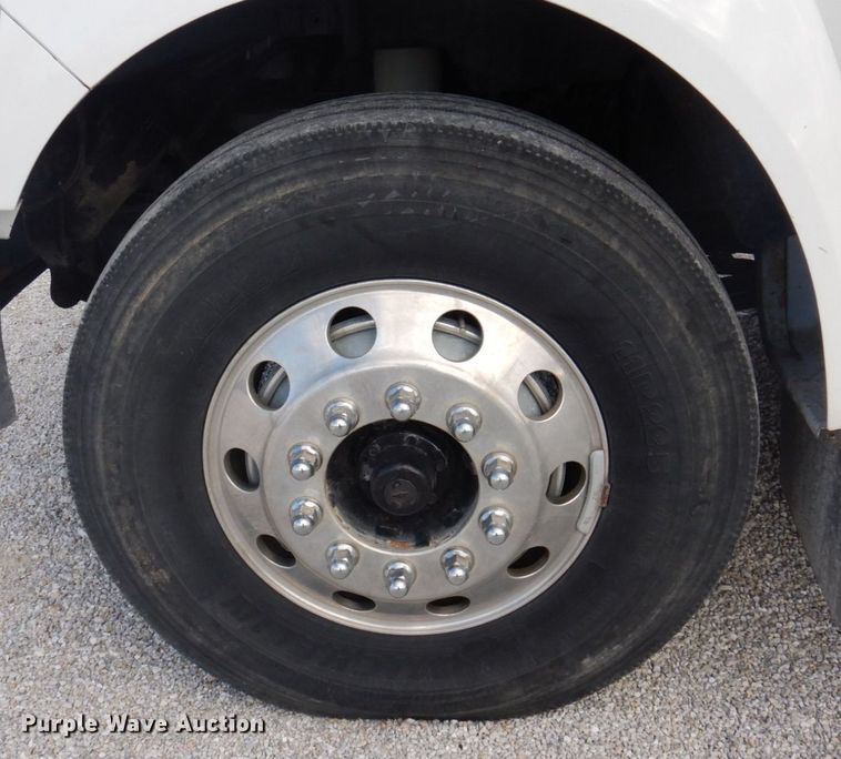 image for item DP0415 2015 Ford F750 Super Duty XLT  SuperCab flatbed truck