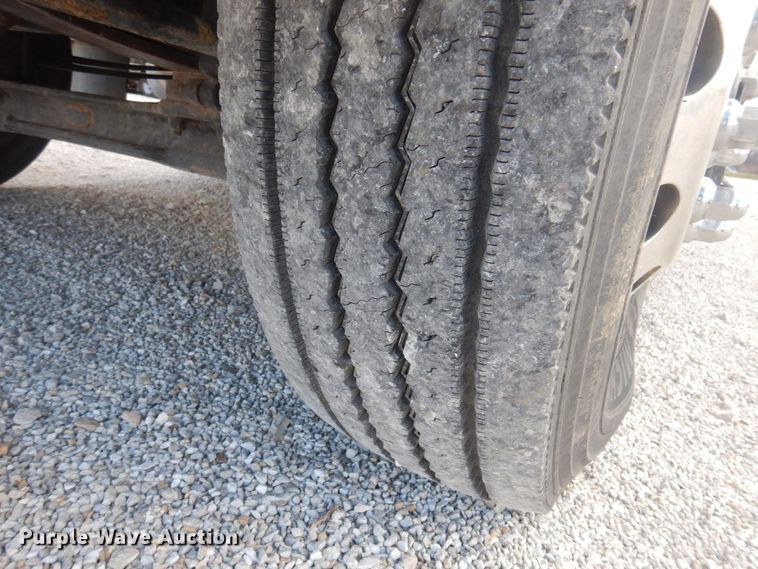 image for item DP0415 2015 Ford F750 Super Duty XLT  SuperCab flatbed truck